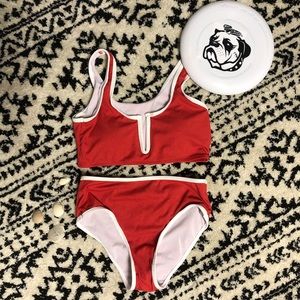 Red and white ripped mid rise two piece suit.